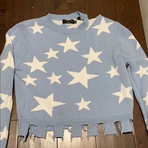 Brand new cute and trendy star sweater!!